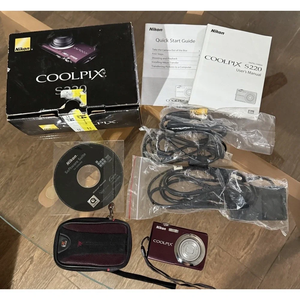 Nikon COOLPIX S220 10MP Digital Camera Plum Bundle W/Battery, Charger, Case Etc.